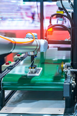 intelligence machine working in mobile phone factory,Smart factory industry 4.0 concept.