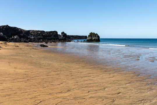 Skar&eth;sv&iacute;k, Skardsvik sandy beach (Hellissandur) in west iceland on a sunny spring day