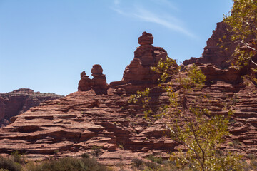 Fototapeta na wymiar Geological formations in the Talampaya National Park in the Argentine Republic. Huge reddish rocks