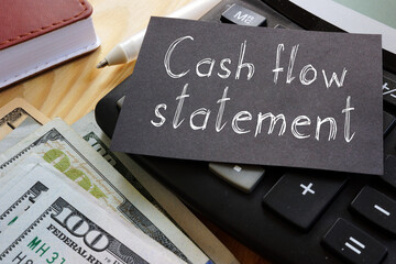 Cash flow statement is shown on the business photo using the text