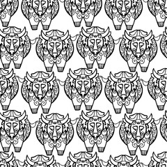 Seamless vector black and white pattern design of ornamental lined bull symbol