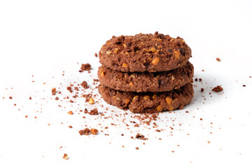 Cocoa cookies with nuts and crumbs isolated on white