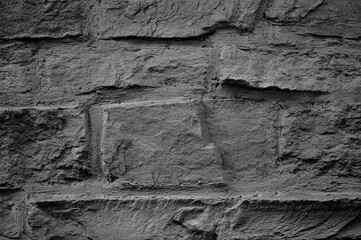 Fragment of a dark gray stone wall
