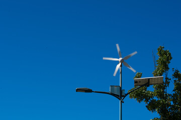 Fototapeta na wymiar wind turbine against sky