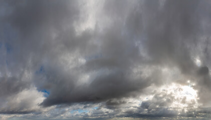 Fantastic dark blue thunderclouds at sunrise, natural composition
