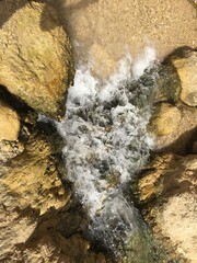 water flowing over rocks