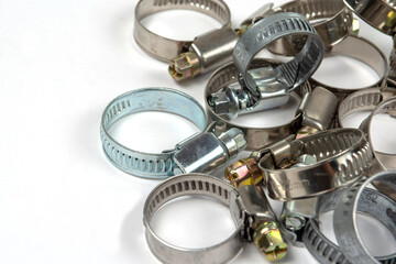 metal clamps on a white background to secure various products