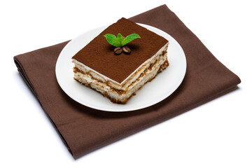 Traditional Italian Tiramisu square dessert portion on ceramic plate isolated on white background with clipping path