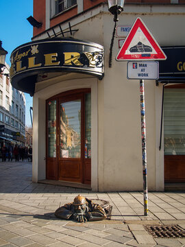 BRATISLAVA, SLOVAKIA-APRIL 2, 2018: Cumil (in english: &bdquo;the watcher") statue also known as Man at Work by Viktor Hulik