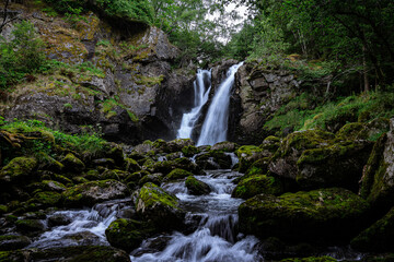 Obraz na płótnie Canvas Double waterfall in a forest