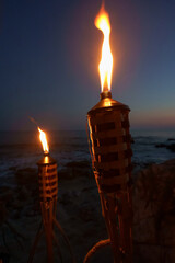 Torches at night with yellow flames and highlights