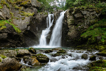 Fototapeta premium Double waterfall in a forest