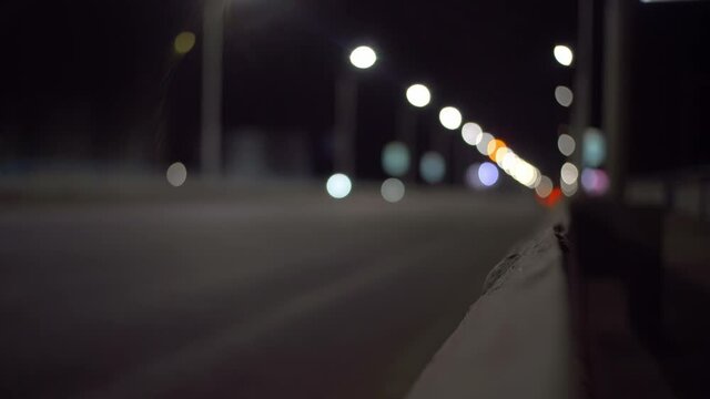 Unfocused fairytale Boulevard. Nightlife. Empty road of the night city. the lights of sin city.