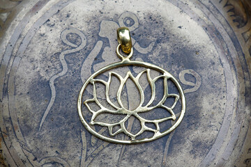 Brass metal boho pendant in the shape of lotus