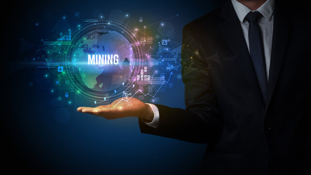 Elegant hand holding MINING inscription, digital technology concept
