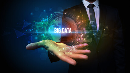 Elegant hand holding BIG DATA inscription, digital technology concept