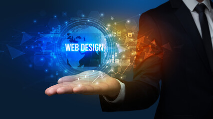 Elegant hand holding WEB DESIGN inscription, digital technology concept