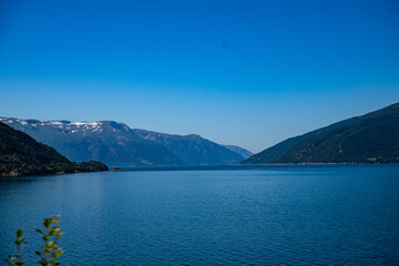 View to a fjord with mountains on the backside in Norway