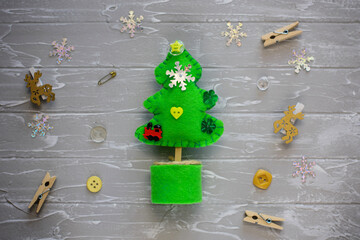  Merry Christmas tree project for kids. DIY Christmas tree felt decoration. Children's crafts. Kids crafts for Christmas. Top view. Flat lay.