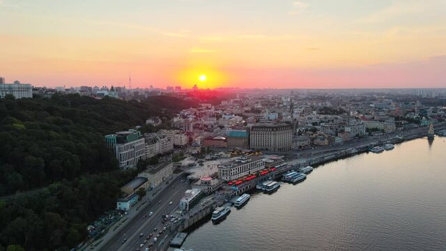 Aerial view of the Poshtova square and the Dnipro river with the sunset in Kiev.