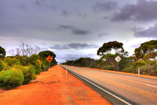Across Australian outback in the rain