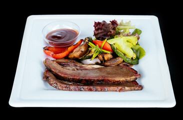 Meat steak with grilled vegetables daddy sauce