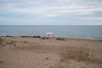 Specchiarica, Italy - September 02, 2020 : View of tourists at the beach