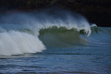 Autumn waves, Jersey, U.K. Water rushing to the shoreline.