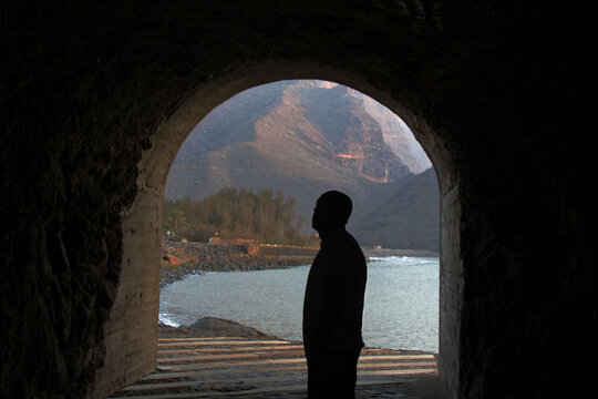 A man silhouette in the tunnel