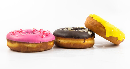 Beautiful glazed donuts side view on white isolated background banner
