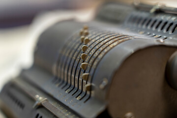 closeup of old calculating machine.