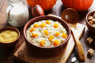 Millet porridge with pumpkin - obrazy, fototapety, plakaty