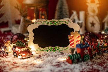 Christmas bord with copy space surrounded with christmas decorations