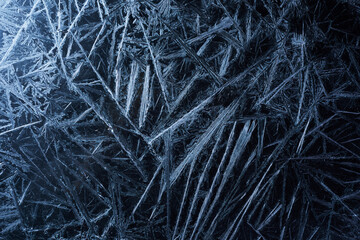 White freeze, ice crystal texture on black background.