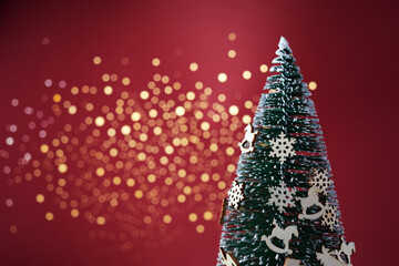 Christmas tree on red background. Zero waste Christmas