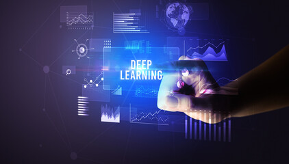Hand touching DEEP LEARNING inscription, new business technology concept