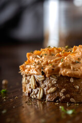 Salmon spread with egg and herbs on bread