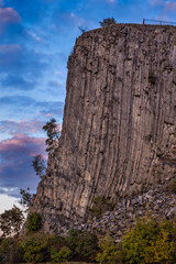Basalt columns of the Hegyestű artificial geological formation in Hungary during the autumn with the twilight cloudy sky in the background