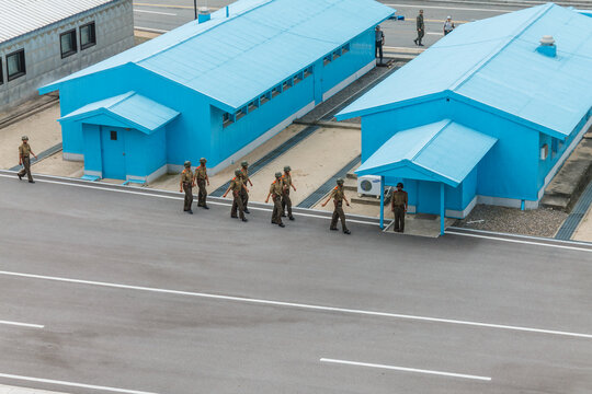 Panmunjom, North Korea - July 30, 2014: Border between North and South Korea. Soldiers of the North Korean army are on the border. The Joint Security Area from the North Korean side.