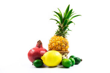 Group of exotic fruits together, bunch, wicker basket and assorted, on white isolated background close up