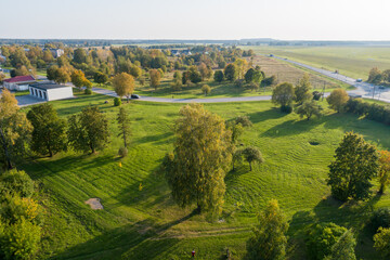 Aerial view of  autumn city park at sunset.