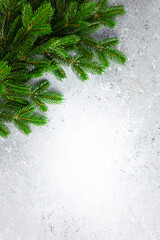 Christmas or New Year background with green fir branches. Winter concept, top view, copy space