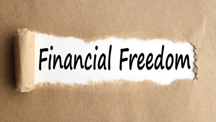FINANCIAL FREEDOM, TEXT on white paper with torn paper background