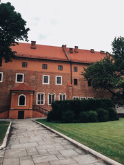 Old beautiful medieval courtyard in the center of Krakow.