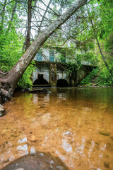 View of dam in forest, Estonia. Nature landscape. Summer.