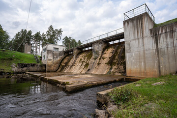 Fototapeta na wymiar View of dam in forest, Estonia. Nature landscape. Summer. 