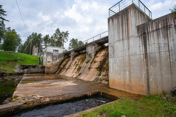 Fototapeta na wymiar View of dam in forest, Estonia. Nature landscape. Summer. 