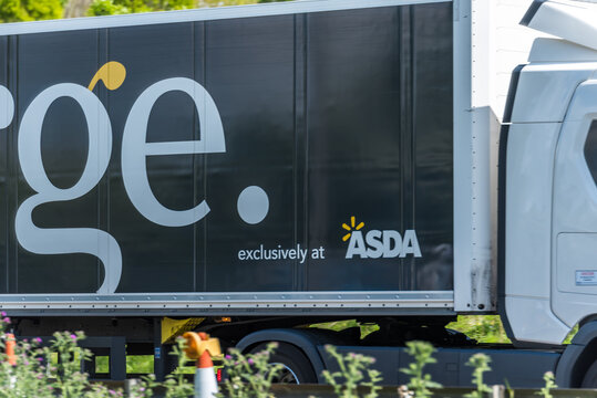 Northampton, UK - May 10th 2019: asda george box truck on uk motorway in fast motion