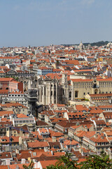 Fototapeta na wymiar Aerial vertical shot of the landscape of Lisbon, Portugal under a clear blue sky