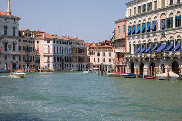 Fototapeta na wymiar Panoramic view of Grand Canal (Canal Grande) with active traffic boats